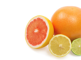 Image of a fresh whole lime, lemon and orange isolated on white