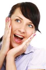 Closeup of a beautiful young woman smiling, isolated on white