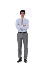 Businessman standing with his arms folded
