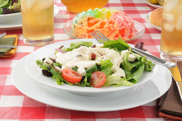 Salad and a gelatin fruit parfait