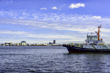 Fototapeta premium Tug ship in harbor