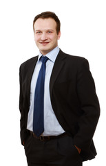 A handsome businessman standing isolated on white background