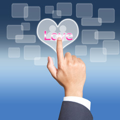 pushing love button on a touch screen interface