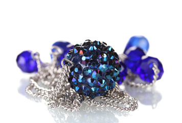 Silver chain with blue stones isolated on white