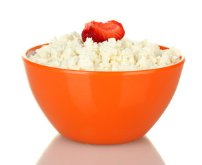 cottage cheese with strawberry in orange bowl isolated on white