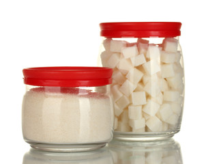 Jars with white lump sugar and white crystal sugar isolated
