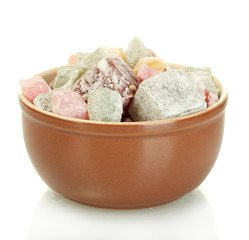 Bowl with delicious turkish delight isolated on white close-up