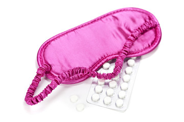 sleeping mask and pills