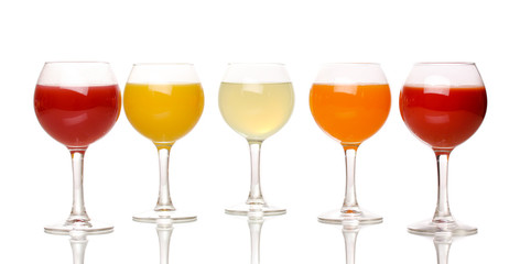 Tropical juices in glasses isolated on white