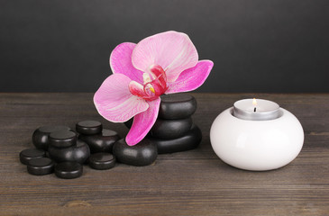 Spa stones with orchid flower and candle