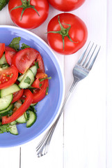 Fresh salad with tomatoes and cucumbers