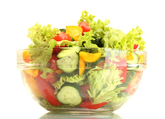 fresh vegetable salad in transparent bowl isolated on white