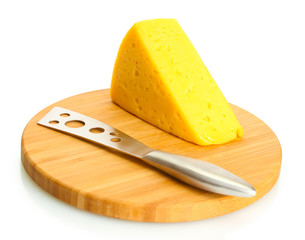 tasty cheese and knife on wooden cutting board isolated on