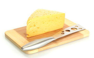 tasty cheese and knife on wooden cutting board isolated on