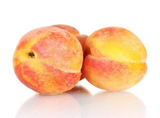 ripe peaches isolated on white background