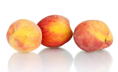 ripe peaches isolated on white background