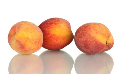 ripe peaches isolated on white background