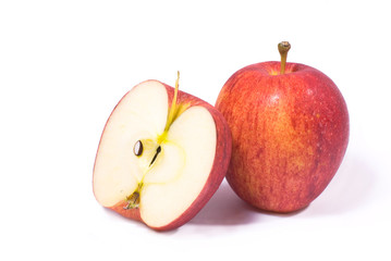 red apple fruits with cut isolated on white background