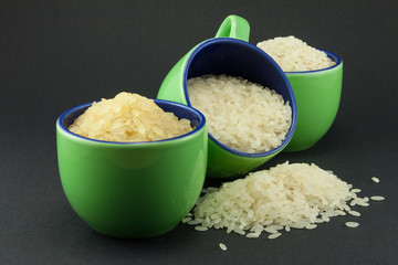Three varieties of rice in three small green cups