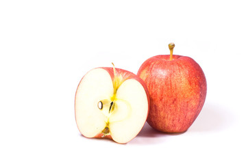 red apple fruits with cut isolated on white background