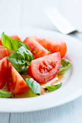 Tomato salad with basil, olive oil and balsamic vinegar