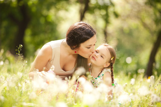 Mother and daughter in the park