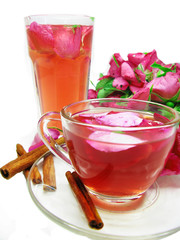 punch cocktail tea drink with wild rose and cinnamon
