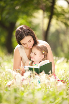 Mother with daughter in the park