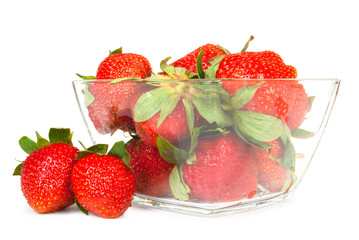 Fresh red strawberries in glass bowl