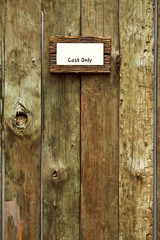 cast only board wooden hanging on the wall