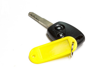 Parking keys and yellow tag on a white background