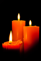 Group of three candles lights