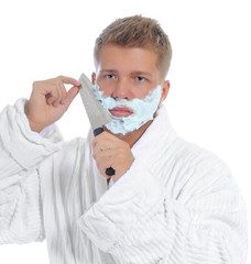 Young man shaving