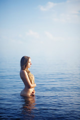 Beautiful nude woman on beach, bali