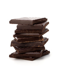 Chocolate bars stack and cinnamon sticks