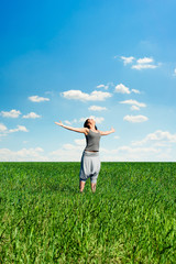 happy young woman at the meadow