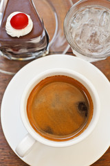 Coffee cup and cake