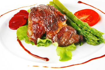 roast meat served on plate