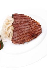 food : pasta with tomato on basil and roasted sirloin beef