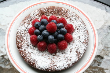 Chocolate cake with raspberry and blueberry