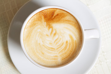 Cappuccino closeup photo