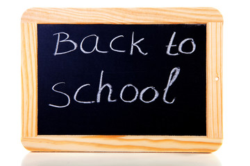back to school written on blackboard slate