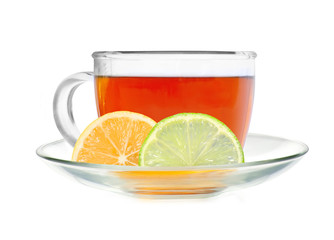 Glass cup tea with lemon and lime slices isolated on a white bac