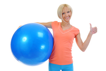 Young woman with blue ball