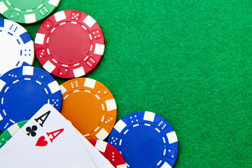 Texas holdem pocket aces on casino table with copy space and chi