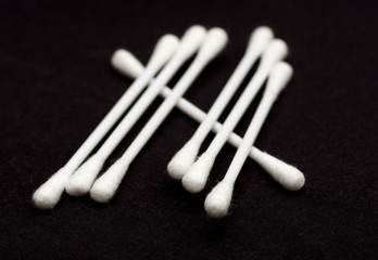 Cotton sticks isolated on black background
