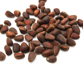 pine nuts on a white background