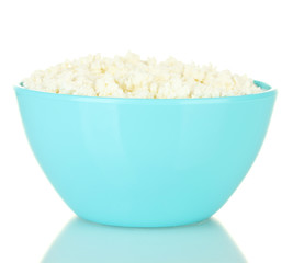 cottage cheese in blue bowl isolated on white