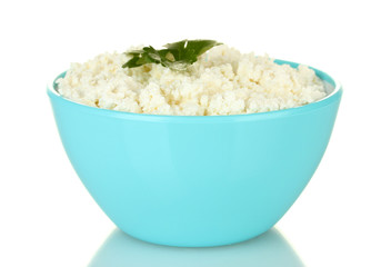 cottage cheese with parsley in blue bowl isolated on white