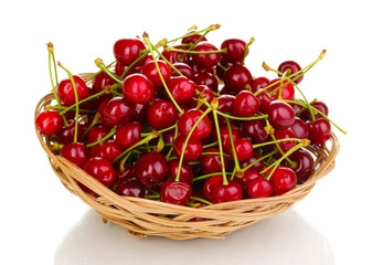 Ripe cherry berries in basket isolated on white